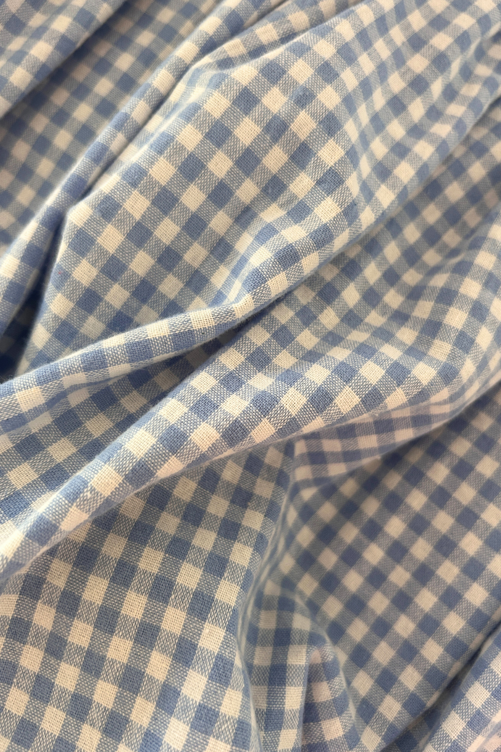 Close-up of Cotton Gingham Fabric – Cornflower Blue Girls Smock Dress with Puff Sleeves