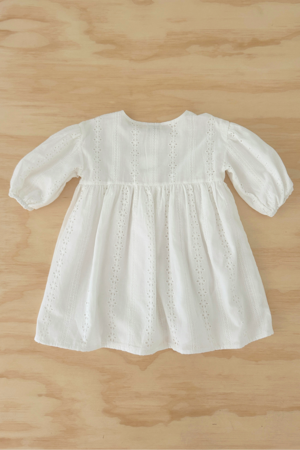 Back view of Girls Milk White Smock Dress with Puff Sleeves