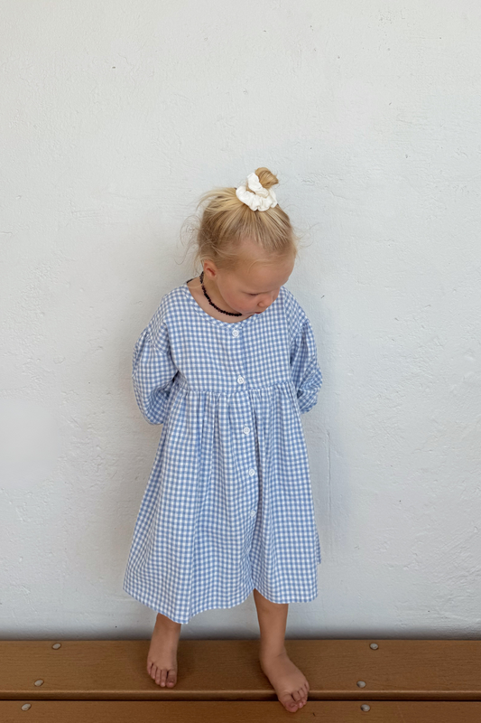Front view of Girls Sunday Smock Dress in Cornflower Blue – Cotton Gingham Fabric
